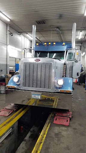 Peterbilt on the lift in our shop bay